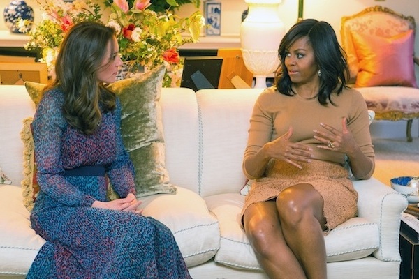 Britain's Kate Duchess of Cambridge talks with US first lady Michelle Obama, right, in the Drawing Room of Kensington Palace, London, prior to a private dinner hosted by Prince William and Kate, Friday April 22, 2016. US President Barack Obama and Michelle plunged into a whirlwind visit to England with royal socializing and political talks. (Dominic Lipinski/Pool via AP)