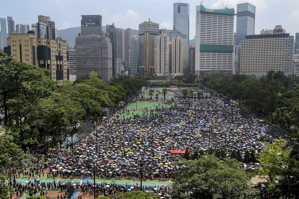 Protesters gather at Victoria Peak to stage protest against the extradition bill in Hong Kong, Sunday, June 16, 2019. Hong Kong residents were gathering Sunday for another massive protest over an unpopular extradition bill that has highlighted the territory's apprehension about relations with mainland China, a week after the crisis brought as many as 1 million into the streets. (Apple Daily via AP)